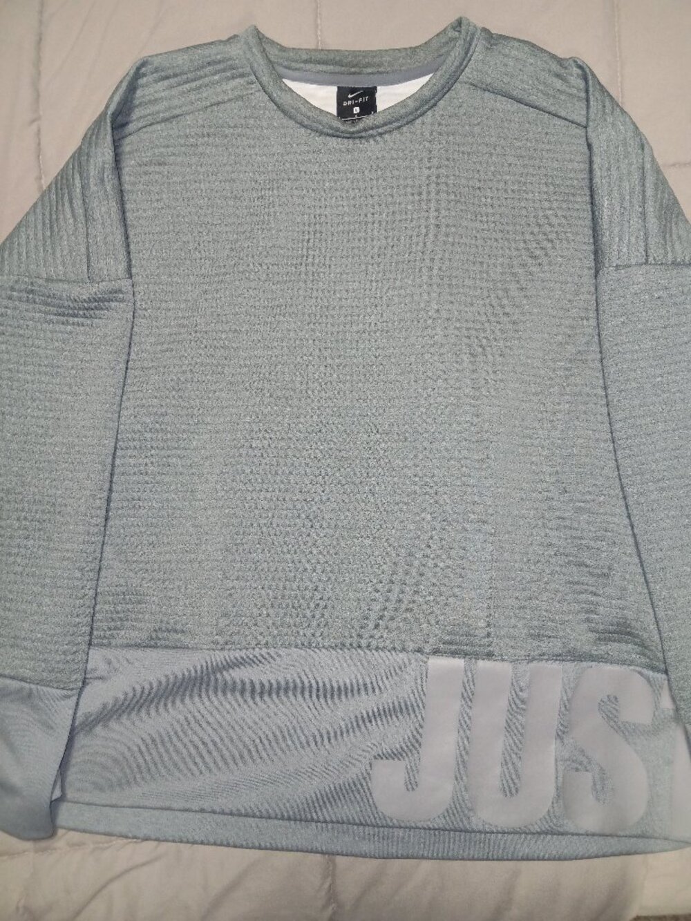 Gray Nike pullover sweater with pockets